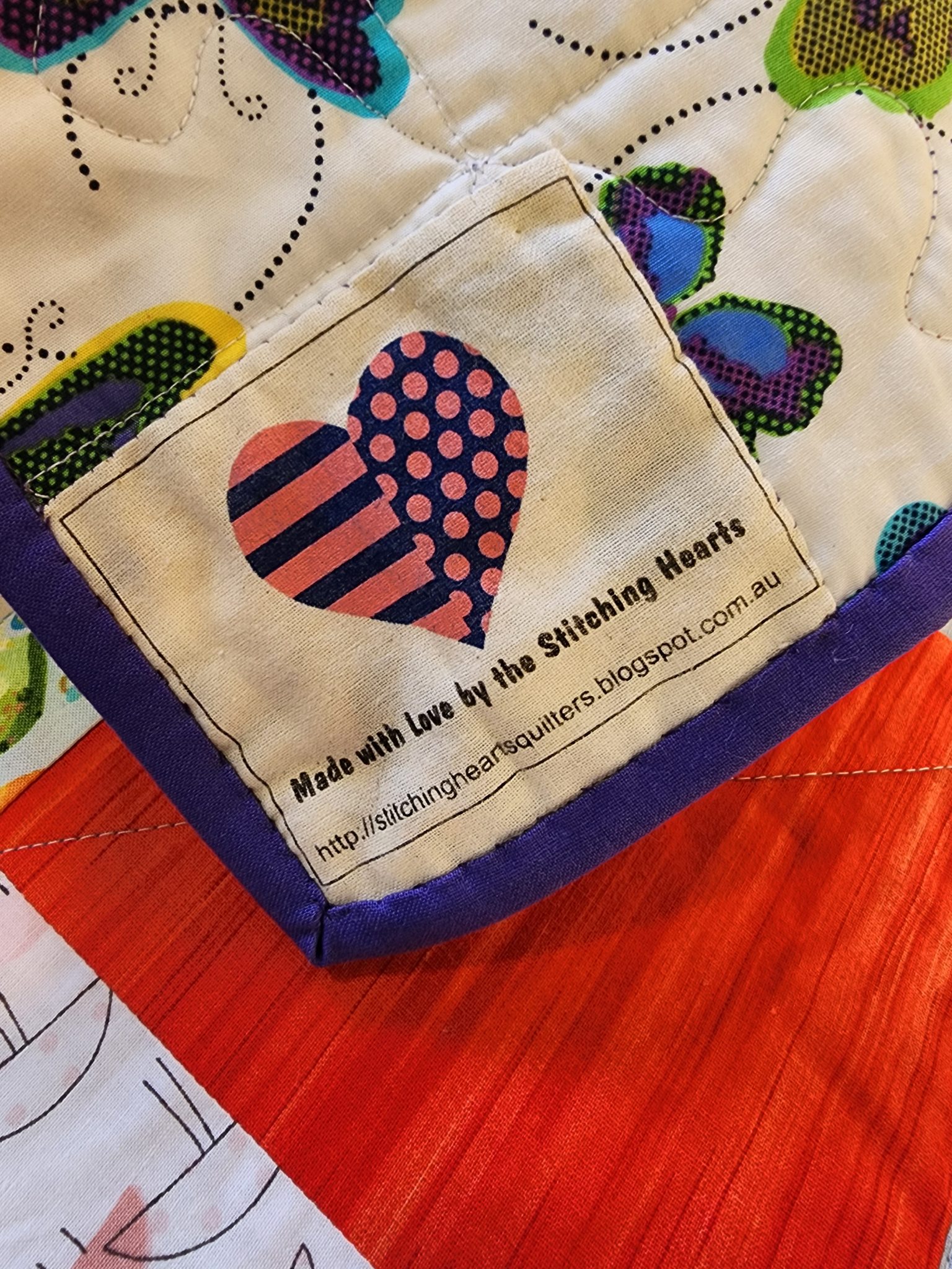 Stitching Hearts Quilters